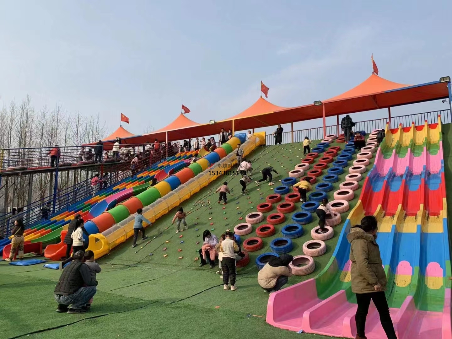 北京彩虹滑道游乐设备红色遮阳棚结构设计生产